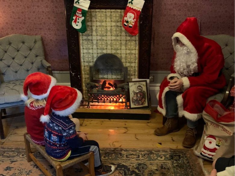 Children talk to Santa